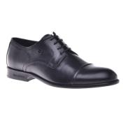 Lace-ups in black leather Baldinini , Black , Heren