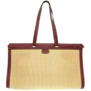 Pre-owned Fabric handbags Hermès Vintage , Beige , Heren