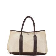 Pre-owned Canvas handbags Hermès Vintage , Beige , Dames