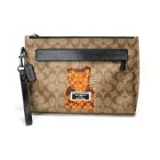 Pre-owned Canvas clutches Coach Pre-owned , Brown , Dames