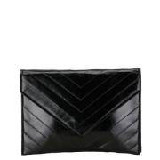 Pre-owned Leather clutches Yves Saint Laurent Vintage , Black , Dames