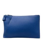 Pre-owned Leather clutches Hermès Vintage , Blue , Dames