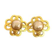 Pre-owned Metal earrings Chanel Vintage , Yellow , Dames