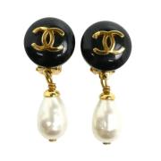 Pre-owned Metal earrings Chanel Vintage , Yellow , Dames