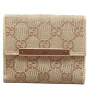 Pre-owned Canvas wallets Gucci Vintage , Beige , Dames