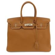 Pre-owned Leather handbags Hermès Vintage , Brown , Dames