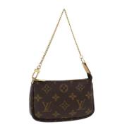 Pre-owned Canvas clutches Louis Vuitton Vintage , Brown , Dames