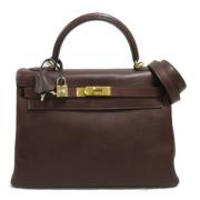 Pre-owned Leather handbags Hermès Vintage , Brown , Dames