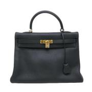 Pre-owned Leather handbags Hermès Vintage , Black , Dames