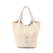 Pre-owned Leather handbags Hermès Vintage , Beige , Dames