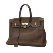 Pre-owned Leather handbags Hermès Vintage , Brown , Dames