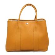 Pre-owned Leather handbags Hermès Vintage , Orange , Dames