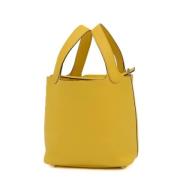 Pre-owned Leather handbags Hermès Vintage , Yellow , Dames