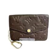 Pre-owned Leather clutches Louis Vuitton Vintage , Brown , Dames