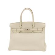 Pre-owned Leather handbags Hermès Vintage , White , Dames