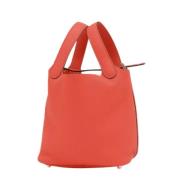 Pre-owned Leather handbags Hermès Vintage , Red , Dames