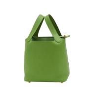 Pre-owned Leather handbags Hermès Vintage , Green , Dames