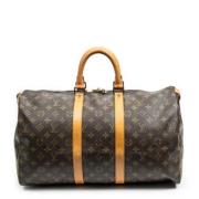 Pre-owned Coated canvas handbags Louis Vuitton Vintage , Brown , Dames