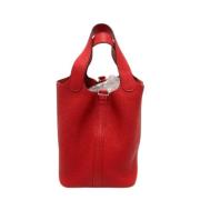 Pre-owned Leather handbags Hermès Vintage , Red , Dames