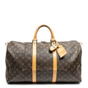 Pre-owned Coated canvas handbags Louis Vuitton Vintage , Brown , Dames