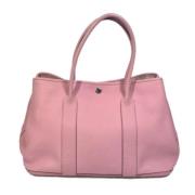 Pre-owned Leather handbags Hermès Vintage , Pink , Dames