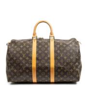 Pre-owned Coated canvas handbags Louis Vuitton Vintage , Brown , Dames