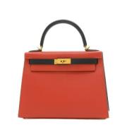 Pre-owned Leather handbags Hermès Vintage , Red , Dames