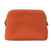 Pre-owned Fabric pouches Hermès Vintage , Orange , Dames