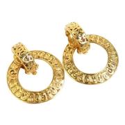 Pre-owned Metal earrings Chanel Vintage , Yellow , Dames