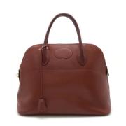 Pre-owned Leather handbags Hermès Vintage , Red , Dames