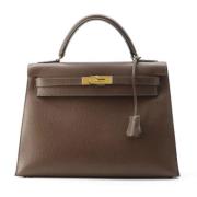 Pre-owned Leather handbags Hermès Vintage , Brown , Dames