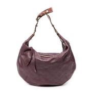 Pre-owned Leather handbags Louis Vuitton Vintage , Purple , Dames