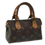 Pre-owned Canvas handbags Louis Vuitton Vintage , Brown , Dames