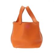 Pre-owned Leather handbags Hermès Vintage , Orange , Dames