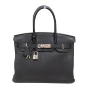 Pre-owned Leather handbags Hermès Vintage , Black , Dames