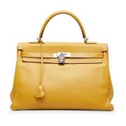 Pre-owned Leather handbags Hermès Vintage , Yellow , Dames