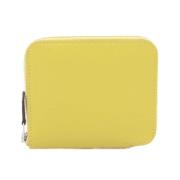 Pre-owned Leather wallets Hermès Vintage , Yellow , Dames