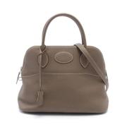 Pre-owned Leather handbags Hermès Vintage , Beige , Dames