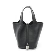 Pre-owned Leather handbags Hermès Vintage , Black , Dames