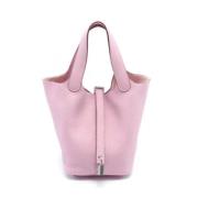 Pre-owned Leather handbags Hermès Vintage , Pink , Dames