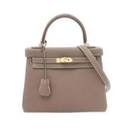 Pre-owned Leather handbags Hermès Vintage , Brown , Dames