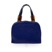 Pre-owned Canvas handbags Yves Saint Laurent Vintage , Blue , Dames