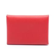 Pre-owned Canvas wallets Hermès Vintage , Red , Unisex