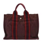 Pre-owned Canvas handbags Hermès Vintage , Red , Dames