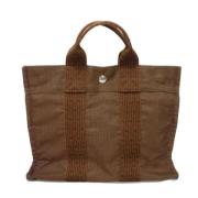 Pre-owned Nylon handbags Hermès Vintage , Brown , Dames