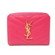 Pre-owned Leather wallets Yves Saint Laurent Vintage , Pink , Dames