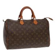 Pre-owned Canvas handbags Louis Vuitton Vintage , Brown , Dames