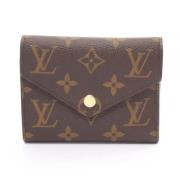 Pre-owned Coated canvas wallets Louis Vuitton Vintage , Brown , Dames