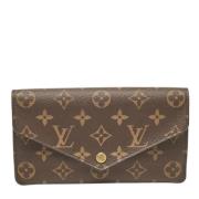 Pre-owned Coated canvas wallets Louis Vuitton Vintage , Pink , Dames