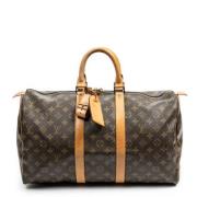 Pre-owned Coated canvas handbags Louis Vuitton Vintage , Brown , Dames